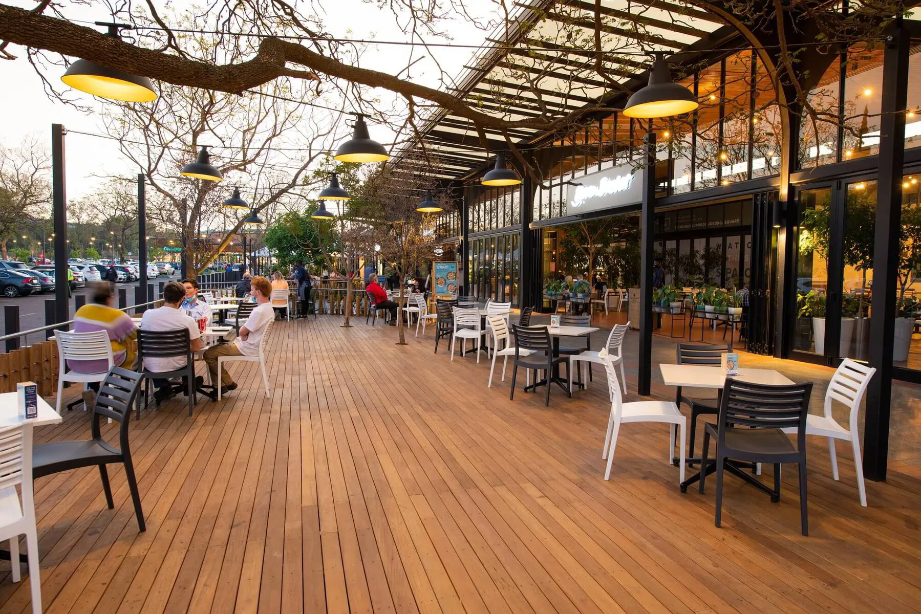 The Neighbourhood Square dining deck at dusk